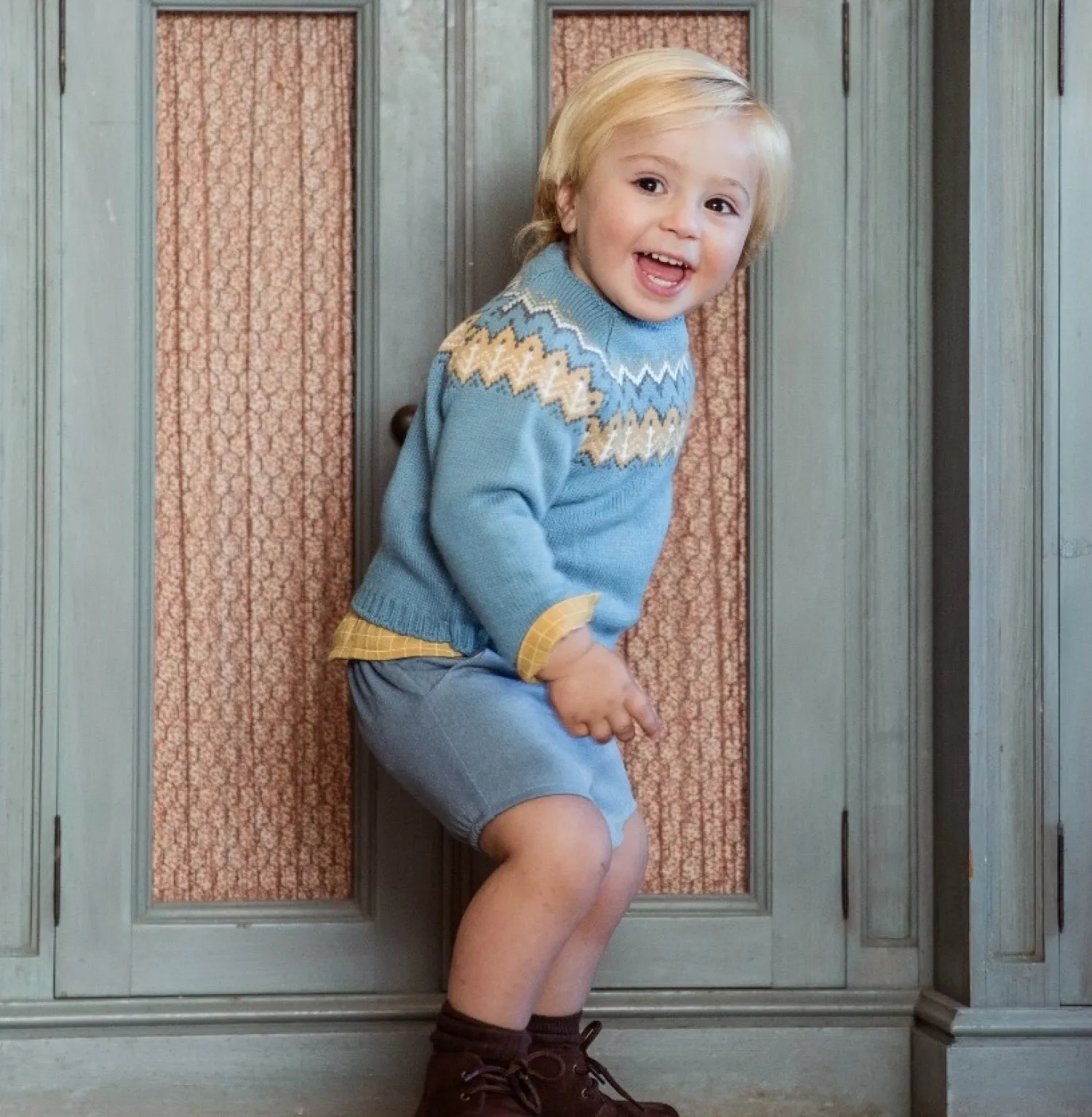 Turquoise knit sweater for boy